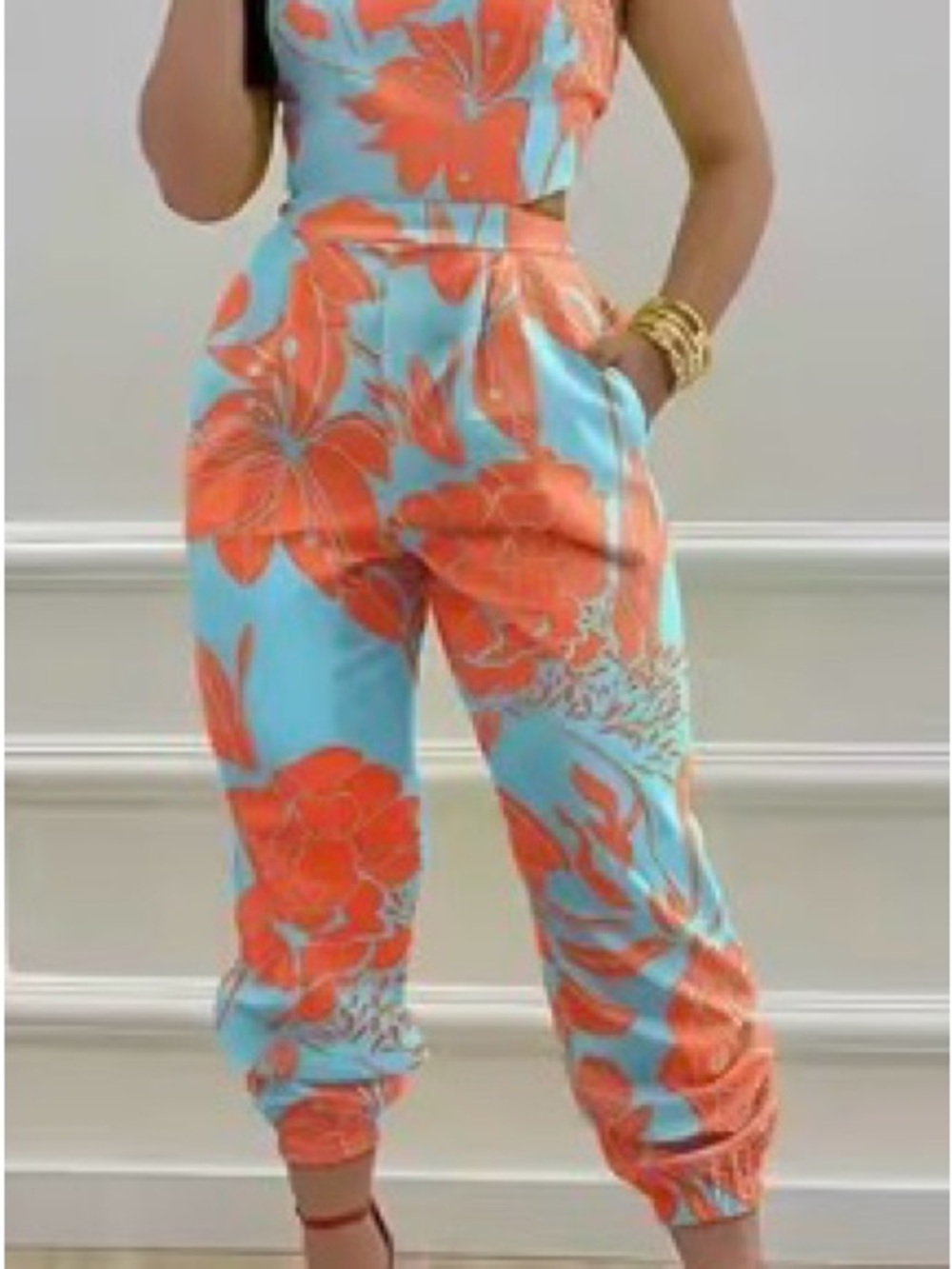 Floral halter jumpsuit in Turquoise and Coral